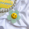 Solid color flower smiley face stand - light green