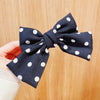 Black polka dots