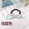 Light blue ribbon bow hair tie