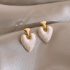 White textured heart earrings
