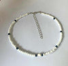 Black and white splicing beads
