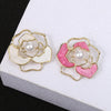 White flower brooch