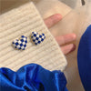 Klein blue heart stud earrings
