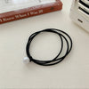 A bead [black]