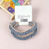 A pair of light blue lace hair ties