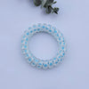 Frosted telephone cord hair ring - blue polka dots