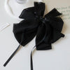 Black-textured chiffon bow clip