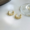A pair of s925 silver needle gold stud earrings