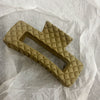 Light brown diamond-shaped grid clip
