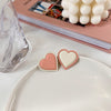 Pink and white heart stud earrings