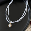 Double pearl pendant