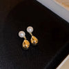 Gold stud earrings