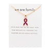 White card with purple ribbon
