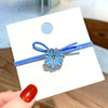 Blue daisy hair tie