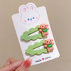 A pair of green with accessories (individual card packaging)