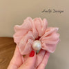 P103 pink hair tie