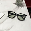 Dark green film with black frame