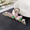 Pink butterfly clip