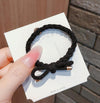 4-45 curly braid knotted black