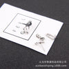 Pair of claw earrings + butterfly buckle earplugs