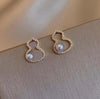 Pearl gourd stud earrings