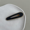 Dark blue water drop duck clip