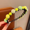 Green ball headband