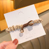 Light brown crystal knotted hair tie