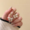 Bow c-shaped earrings