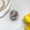 Metal bracket - folded beauty head - silver