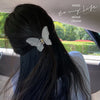 White butterfly clip