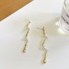 A pair of s925 silver needle gold stud earrings