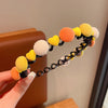 Yellow ball headband